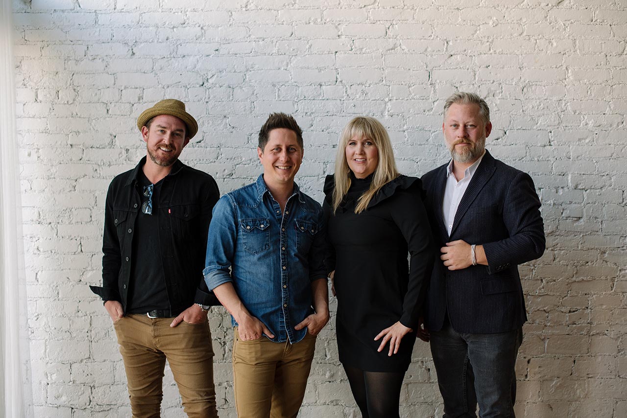 studio group portrait idea collective smiling professionals